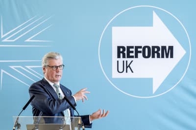 Reform vows to cut number of MSPs and quangos in manifesto for Holyrood vote
