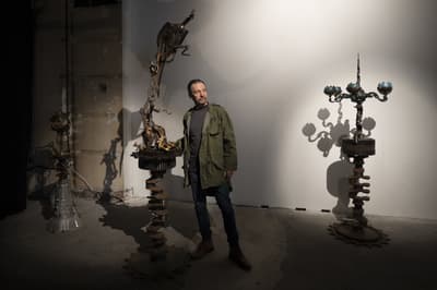 Glastonbury Festival artist unveils exhibition of works made from junk materials