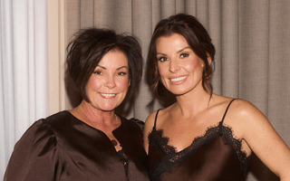 Coleen Rooney parties with her lookalike mum at launch of her Primark collection